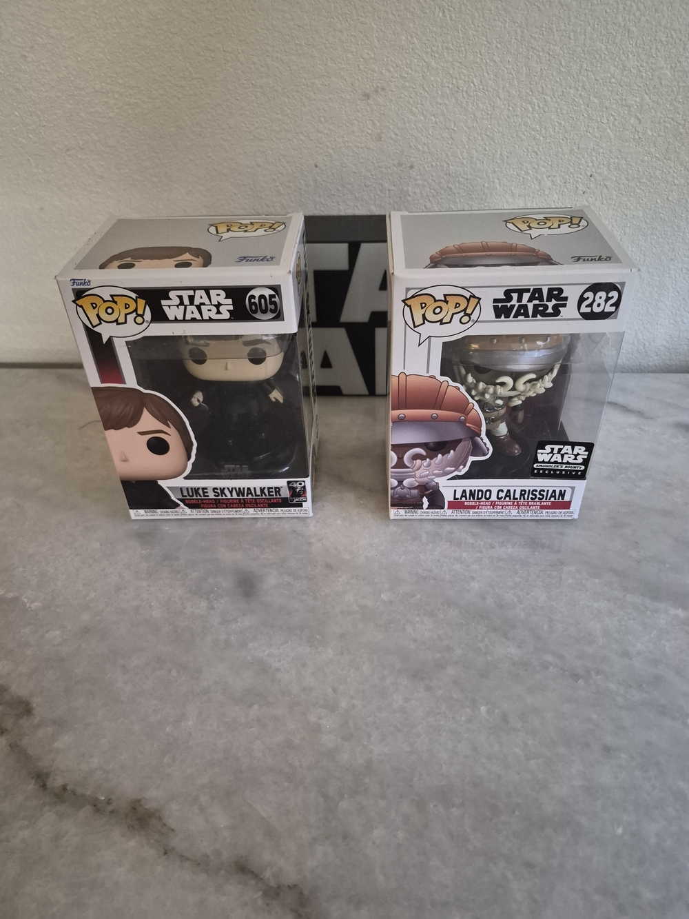 Funko Star Wars Luke Skywalker & Lando Calrissian Vinyl Figures - Black & Brown